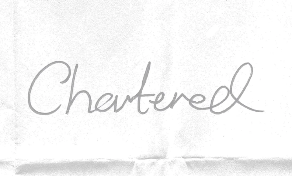 Handwritten note reading Chartered