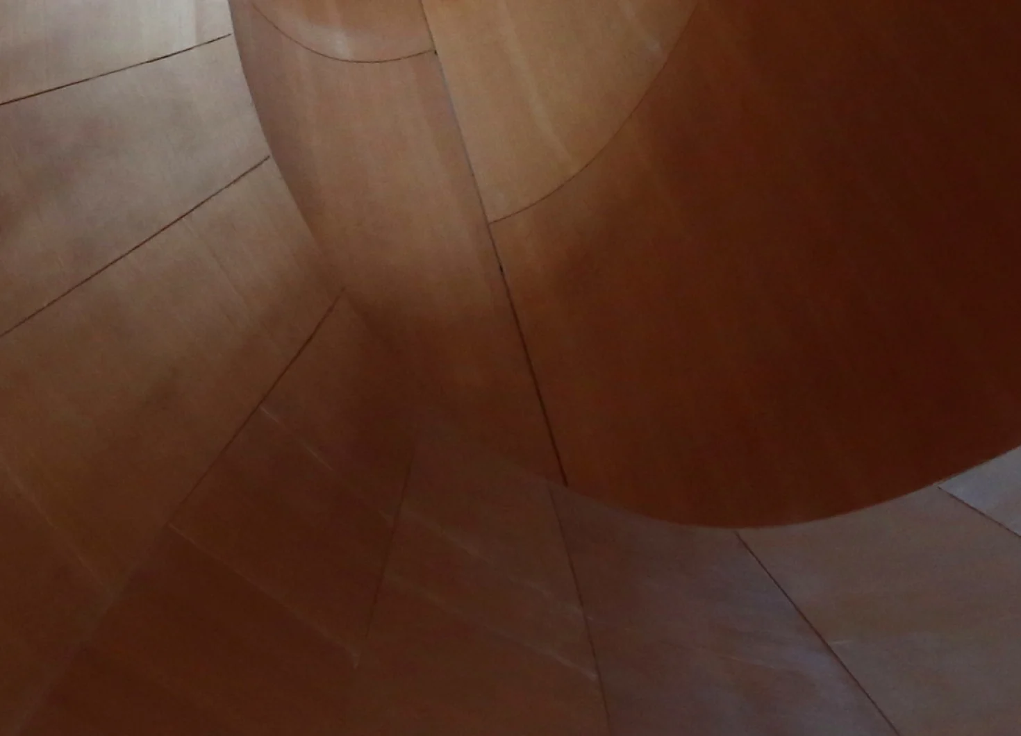 Curved wooden panelling in a modern interior